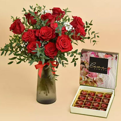 12 Red Roses in Premium Vase And Chocolates